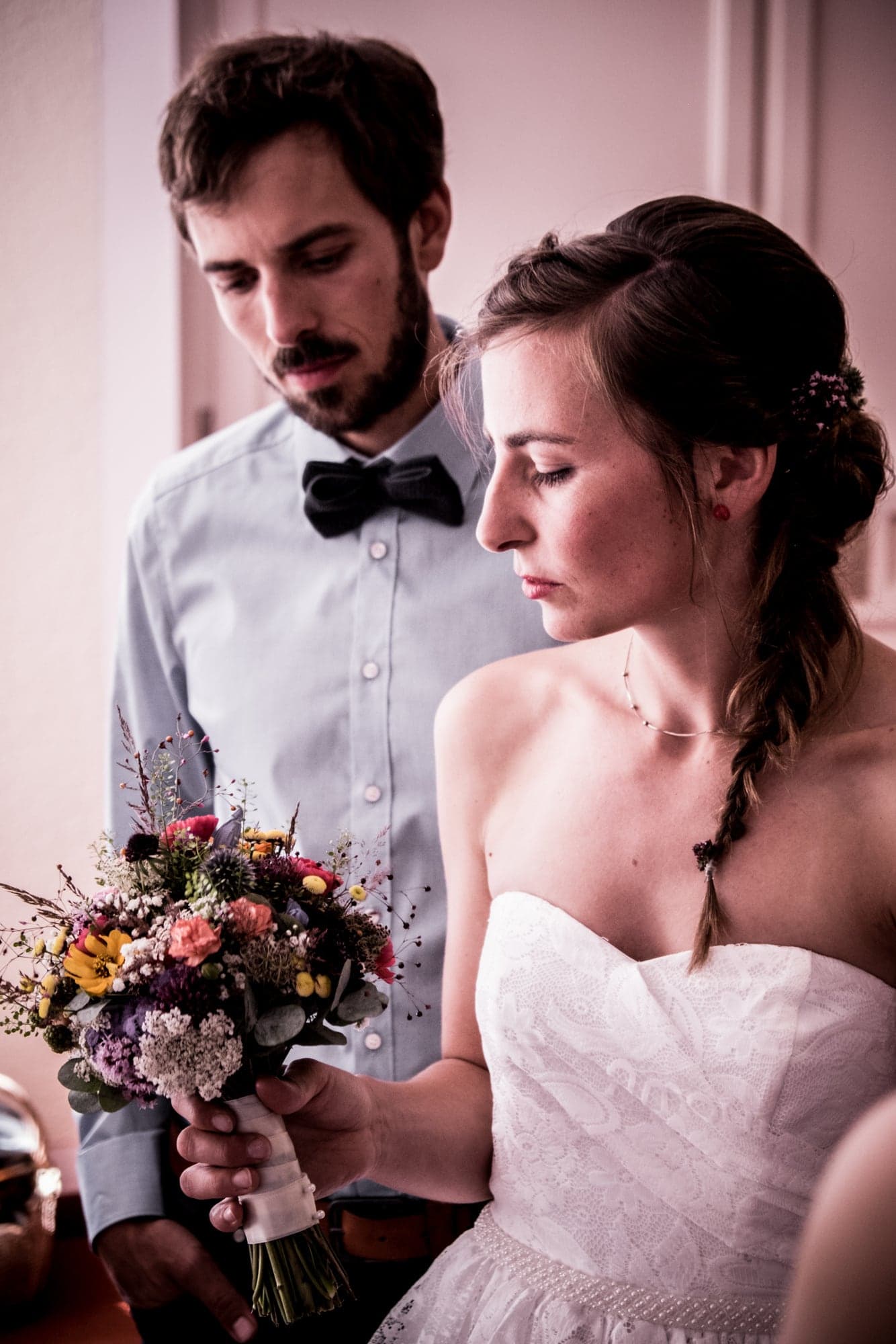 A bride and groom in a quiet moment